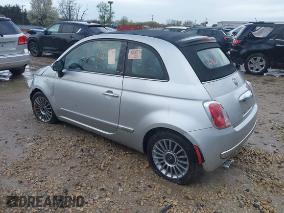 2012 FIAT 500 Lounge with VIN 3C3CFFER1CT148868, listed as a IAAI auction lot 42105829 with 82,746 mi miles and . Bid and sale history available at DreamBid. Image 3.