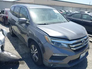 2016 Honda Pilot EX-L z VIN 5FNYF5H59GB040426, wystawiony jako IAAI lot #42170665 z przebiegiem 69 569 mil mil oraz . Historia ofert i sprzedaży dostępna na DreamBid. Obrazek 1.
