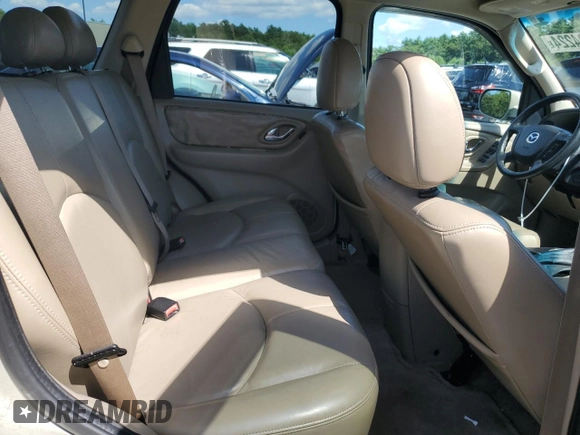 2005 Mazda Tribute i with VIN 4F2YZ92Z55KM53695, listed as a Copart auction lot 61494224 with 144,911 mi miles and Salvage Title. Bid and sale history available at carsss.com. Image 11.