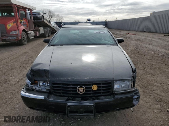 1999 Cadillac Eldorado Touring z VIN 1G6ET1298XU602343, wystawiony jako Copart lot #44327195 z przebiegiem 52 327 mil mil oraz Szkody całkowita. Historia ofert i sprzedaży dostępna na DreamBid. Obrazek 5.