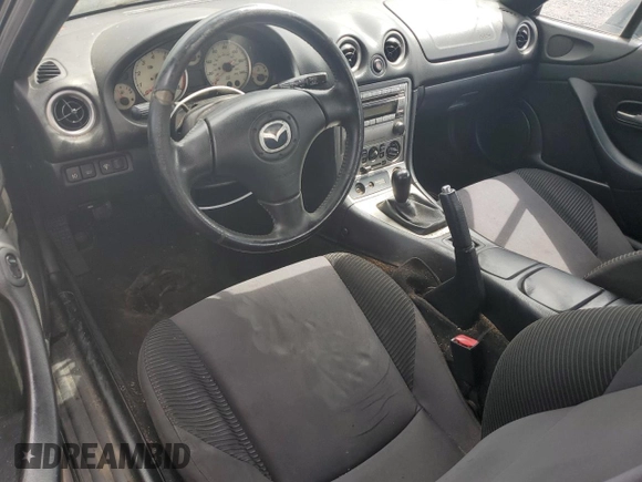 2005 Mazda MX-5 Miata LS with VIN JM1NB353X50410655, listed as a Copart auction lot 63337515 with 118,409 mi miles and Clean title. Bid and sale history available at DreamBid. Image 8.