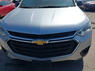 2018 Chevrolet Traverse LS z VIN 1GNERFKWXJJ120682, wystawiony jako IAAI lot #42007628 z przebiegiem 112 795 mil mil oraz . Historia ofert i sprzedaży dostępna na DreamBid. Obrazek 12.