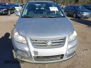 2013 Suzuki SX4 Crossover with VIN JS2YB5A33D6100797, listed as a IAAI auction lot 40826956 with 110,016 mi miles. Bid and sale history available at carsss.com. Image 6.