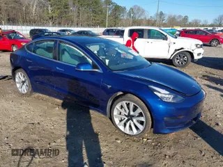 2019 Tesla Model 3 Long Range with VIN 5YJ3E1EB7KF454636, listed as a IAAI auction lot 41853972 with 56,916 mi miles. Bid and sale history available at carsss.com. Image 1.