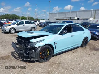 2016 Cadillac CTS-V z VIN 1G6A15S64G0118212, wystawiony jako IAAI lot #39978487 z przebiegiem Nie podano mil oraz . Historia ofert i sprzedaży dostępna na DreamBid. Obrazek 18.