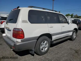 1999 Toyota Land Cruiser with VIN JT3HT05J0X0059222, listed as a Copart auction lot 77713294 with 406,869 mi miles and Clean Title. Bid and sale history available at carsss.com. Image 3.