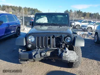 2015 Jeep Wrangler Unlimited Sport with VIN 1C4BJWDG5FL766989, listed as a IAAI auction lot 41342159 with 182,483 mi miles. Bid and sale history available at carsss.com. Image 12.