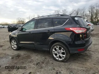 2013 Ford Escape SEL with VIN 1FMCU9HX4DUC21795, listed as a Copart auction lot 50411635 with 161,118 mi miles and Salvage Title. Bid and sale history available at carsss.com. Image 2.