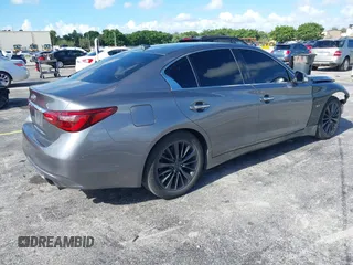 2014 Infiniti Q50 Premium with VIN JN1BV7AP7EM684448, listed as a IAAI auction lot 42564087 with 79,207 mi miles and . Bid and sale history available at DreamBid. Image 4.