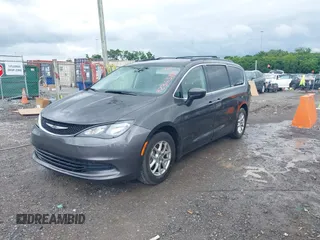 2020 Chrysler Voyager LXi z VIN 2C4RC1DG8LR197537, wystawiony jako IAAI lot #42363819 z przebiegiem 163 779 mil mil oraz . Historia ofert i sprzedaży dostępna na DreamBid. Obrazek 17.