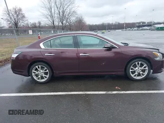 2014 Nissan Maxima SV z VIN 1N4AA5AP7EC465106, wystawiony jako IAAI lot #41815587 z przebiegiem 160 914 mil mil oraz . Historia ofert i sprzedaży dostępna na DreamBid. Obrazek 13.