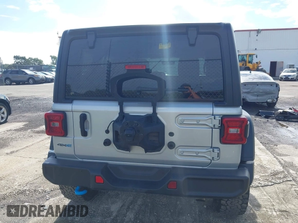 2023 Jeep Wrangler Rubicon with VIN 1C4JJXR63PW703424, listed as a IAAI auction lot 42639653 with 46,412 mi miles and . Bid and sale history available at DreamBid. Image 15.