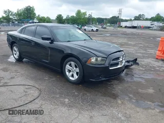 2013 Dodge Charger SE z VIN 2C3CDXBG4DH522639, wystawiony jako IAAI lot #42220383 z przebiegiem 164 319 mil mil oraz . Historia ofert i sprzedaży dostępna na DreamBid. Obrazek 1.