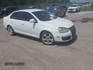 2008 Volkswagen Jetta GLI z VIN 3VWBJ71K38M173175, wystawiony jako IAAI lot #42333394 z przebiegiem 147 734 mil mil oraz . Historia ofert i sprzedaży dostępna na DreamBid. Obrazek 1.
