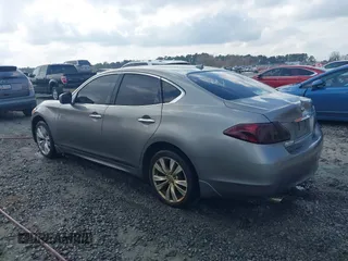 2011 Infiniti M with VIN JN1BY1AR2BM374001, listed as a IAAI auction lot 41544244 with 235,343 mi miles and . Bid and sale history available at DreamBid. Image 3.