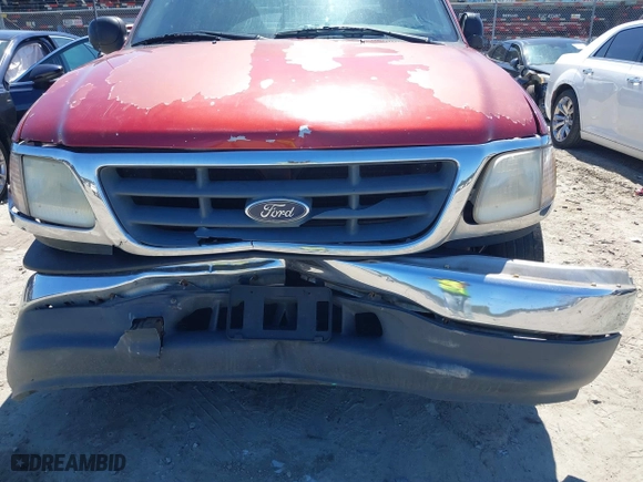 2001 Ford F-150 SuperCrew XLT with VIN 1FTRW07L11KE20412, listed as a IAAI auction lot 41877980 with 1 mi miles. Bid and sale history available at carsss.com. Image 6.