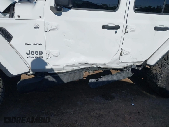 2019 Jeep Wrangler Unlimited Sahara with VIN 1C4HJXEN2KW591557, listed as a IAAI auction lot 41962034 with 88,691 mi miles and . Bid and sale history available at DreamBid. Image 6.
