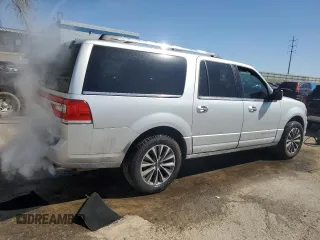 2015 Lincoln Navigator z VIN 5LMJJ3HT9FEJ02435, wystawiony jako Copart lot #49394715 z przebiegiem 117 734 mil mil oraz Czysty tytuł • Clean title. Historia ofert i sprzedaży dostępna na DreamBid. Obrazek 3.