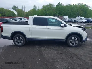 2019 Honda Ridgeline RTL-E with VIN 5FPYK3F75KB020713, listed as a IAAI auction lot 42191152 with 31,245 mi miles and . Bid and sale history available at DreamBid. Image 13.