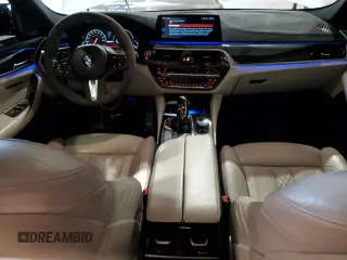 2018 BMW 5 Series M550i xDrive with VIN WBAJB9C5XJB035514, listed as a Copart auction lot 50045425 with 76,325 mi miles and Salvage Title. Bid and sale history available at carsss.com. Image 8.