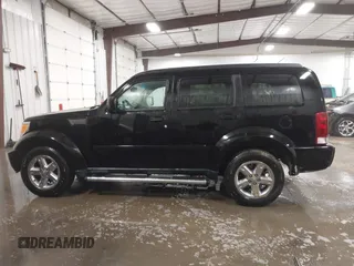 2007 Dodge Nitro SLT with VIN 1D8GT58K77W724530, listed as a IAAI auction lot 41499022 with 214,183 mi miles. Bid and sale history available at carsss.com. Image 14.