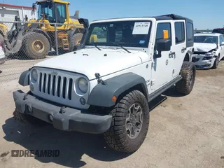 2014 Jeep Wrangler Unlimited Sport with VIN 1C4BJWDG1EL121190, listed as a IAAI auction lot 41913348 with 162,066 mi miles and . Bid and sale history available at DreamBid. Image 17.