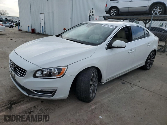 2015 Volvo S60 T5 Drive-E Platinum with VIN YV140MFD7F2301858, listed as a Copart auction lot 44586105 with 50,575 mi miles and Salvage Title. Bid and sale history available at carsss.com. Image 1.