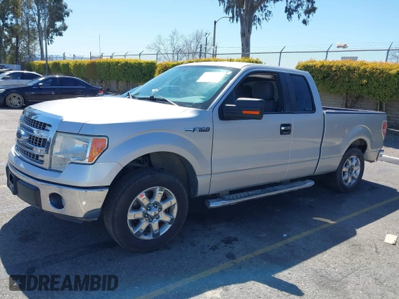 2014 Ford F-150 XL with VIN 1FTEX1CM2EFB01776, listed as a IAAI auction lot 41806274 with 157,704 mi miles. Bid and sale history available at carsss.com. Image 18.