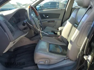 2003 Cadillac CTS with VIN 1G6DM57N630125967, listed as a Copart auction lot 73190504 with 136,655 mi miles and Salvage Title. Bid and sale history available at carsss.com. Image 7.