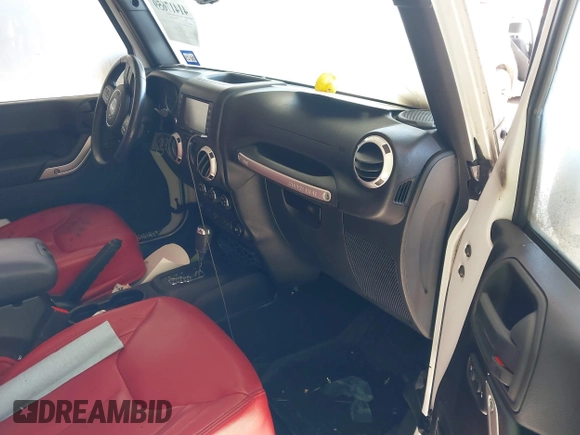 2015 Jeep Wrangler Altitude z VIN 1C4GJWBG2FL714146, wystawiony jako IAAI lot #41417659 z przebiegiem Nie podano mil oraz . Historia ofert i sprzedaży dostępna na DreamBid. Obrazek 5.