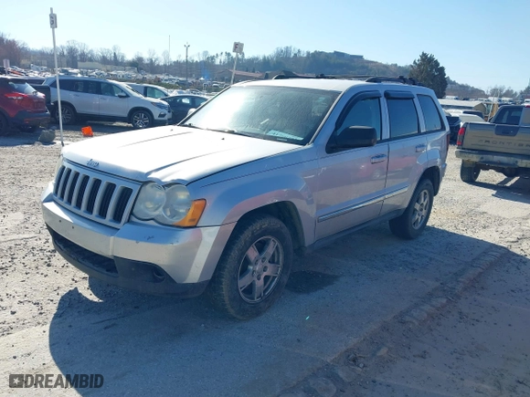 2010 Jeep Grand Cherokee Laredo with VIN 1J4PS4GKXAC103153, listed as a IAAI auction lot 41760743 with 185,138 mi miles. Bid and sale history available at carsss.com. Image 2.