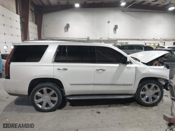2019 Cadillac Escalade Luxury with VIN 1GYS4BKJXKR206806, listed as a IAAI auction lot 41571123 with 90,278 mi miles. Bid and sale history available at carsss.com. Image 13.