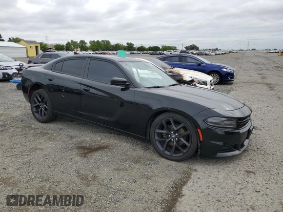 2020 Dodge Charger SXT with VIN 2C3CDXBG9LH167465, listed as a Copart auction lot 51927475 with 85,489 mi miles and Salvage Title. Bid and sale history available at carsss.com. Image 4.