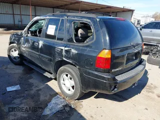 2003 GMC Envoy SLE with VIN 1GKDS13S732134354, listed as a IAAI auction lot 41305506 with 221,733 mi miles. Bid and sale history available at carsss.com. Image 3.