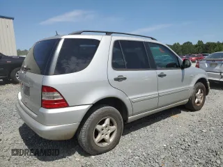 2001 Mercedes-Benz M-Class with VIN 4JGAB54EX1A271687, listed as a Copart auction lot 57046944 with 209,561 mi miles and Salvage Title. Bid and sale history available at carsss.com. Image 3.