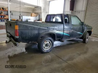 1986 Nissan Hardbody E z VIN 1N6ND16Y7GC413942, wystawiony jako Copart lot #57677605 z przebiegiem 126 183 mil mil oraz Tytuł czysty. Historia ofert i sprzedaży dostępna na DreamBid. Obrazek 3.