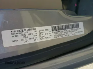 2014 Dodge Grand Caravan American Value with VIN 2C4RDGBG5ER248322, listed as a Copart auction lot 55160615 with Not Provided miles and Clean Title. Bid and sale history available at DreamBid. Image 13.
