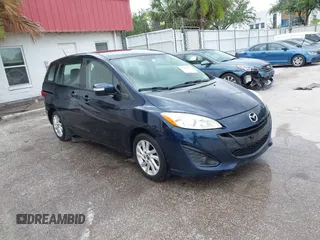 2014 Mazda 5 Sport with VIN JM1CW2BL6E0169672, listed as a IAAI auction lot 42422459 with 212,179 mi miles and . Bid and sale history available at DreamBid. Image 1.