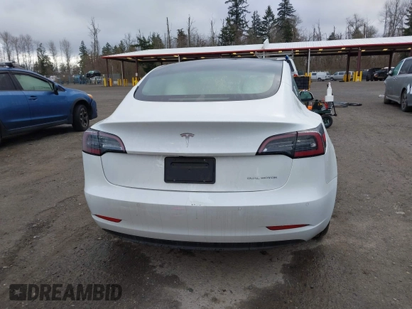2021 Tesla Model 3 Long Range with VIN 5YJ3E1EB3MF856009, listed as a IAAI auction lot 41809767 with 42,072 mi miles. Bid and sale history available at carsss.com. Image 17.
