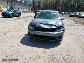 2017 Volkswagen Jetta 1.4T SE with VIN 3VWB67AJ7HM318369, listed as a Copart auction lot 52027915 with 128,335 mi miles and Salvage Title. Bid and sale history available at carsss.com. Image 13.