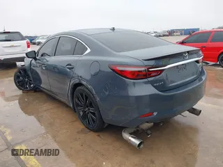 2021 Mazda 6 Carbon Edition with VIN JM1GL1WY0M1600414, listed as a IAAI auction lot 41551393 with 36,780 mi miles and . Bid and sale history available at DreamBid. Image 3.