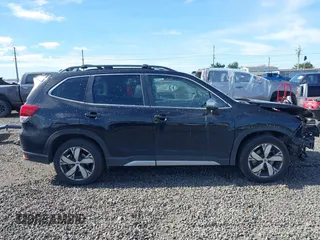 2021 Subaru Forester Touring with VIN JF2SKAXCXMH434072, listed as a IAAI auction lot 41857293 with 59,474 mi miles. Bid and sale history available at carsss.com. Image 14.