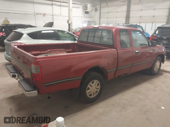 1995 Toyota T100 DX with VIN JT4VD12E0S0013715, listed as a IAAI auction lot 42140145 with 276,371 mi miles. Bid and sale history available at carsss.com. Image 4.