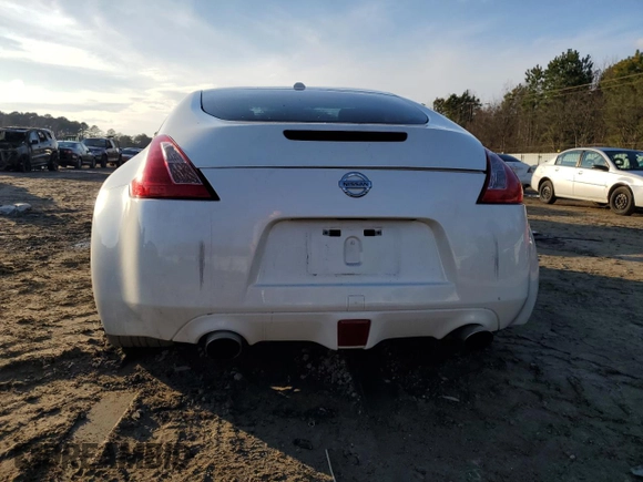 2014 Nissan 370Z Touring with VIN JN1AZ4EH8EM631324, listed as a Copart auction lot 85573524 with 0 mi miles and Salvage Title. Bid and sale history available at carsss.com. Image 6.