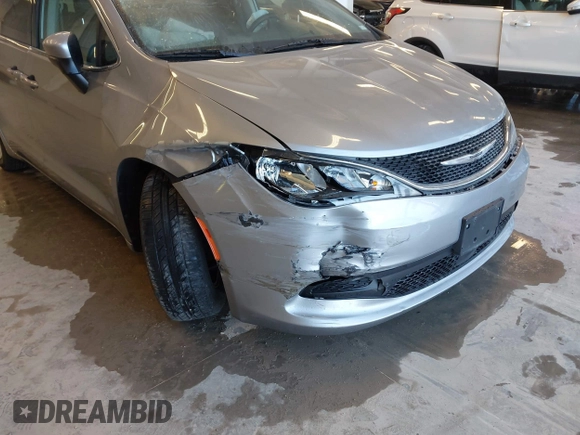 2021 Chrysler Voyager LXi with VIN 2C4RC1DG2MR506453, listed as a IAAI auction lot 41770938 with 90,255 mi miles and . Bid and sale history available at DreamBid. Image 19.