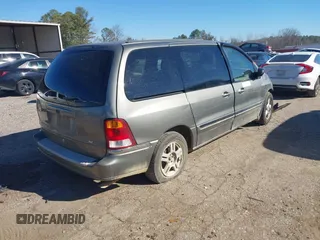 2003 Ford Windstar SE with VIN 2FMZA52473BB65706, listed as a IAAI auction lot 41300897 with 160,965 mi miles and . Bid and sale history available at DreamBid. Image 4.