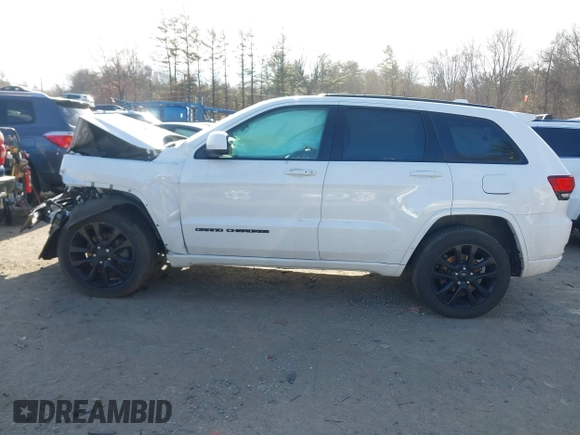 2017 Jeep Grand Cherokee Laredo with VIN 1C4RJFAG9HC910422, listed as a IAAI auction lot 41185537 with 84,784 mi miles. Bid and sale history available at carsss.com. Image 14.