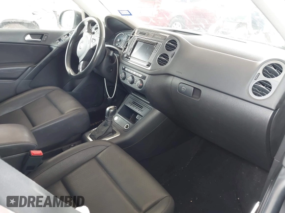 2017 Volkswagen Tiguan Wolfsburg Edition with VIN WVGRV7AX5HW501063, listed as a IAAI auction lot 42099362 with 76,597 mi miles and . Bid and sale history available at DreamBid. Image 5.