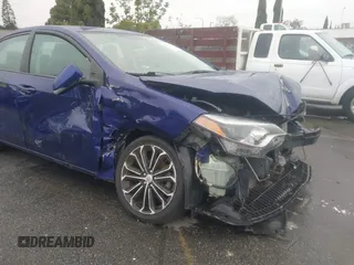 2014 Toyota Corolla L with VIN 5YFBURHE8EP173523, listed as a IAAI auction lot 41802729 with 77,336 mi miles and . Bid and sale history available at DreamBid. Image 6.