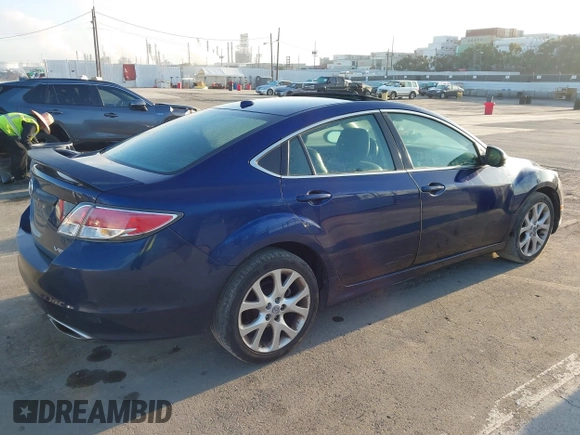 2009 Mazda 6 S Grand Touring with VIN 1YVHP82BX95M21357, listed as a IAAI auction lot 42013043 with 119,701 mi miles and . Bid and sale history available at DreamBid. Image 4.